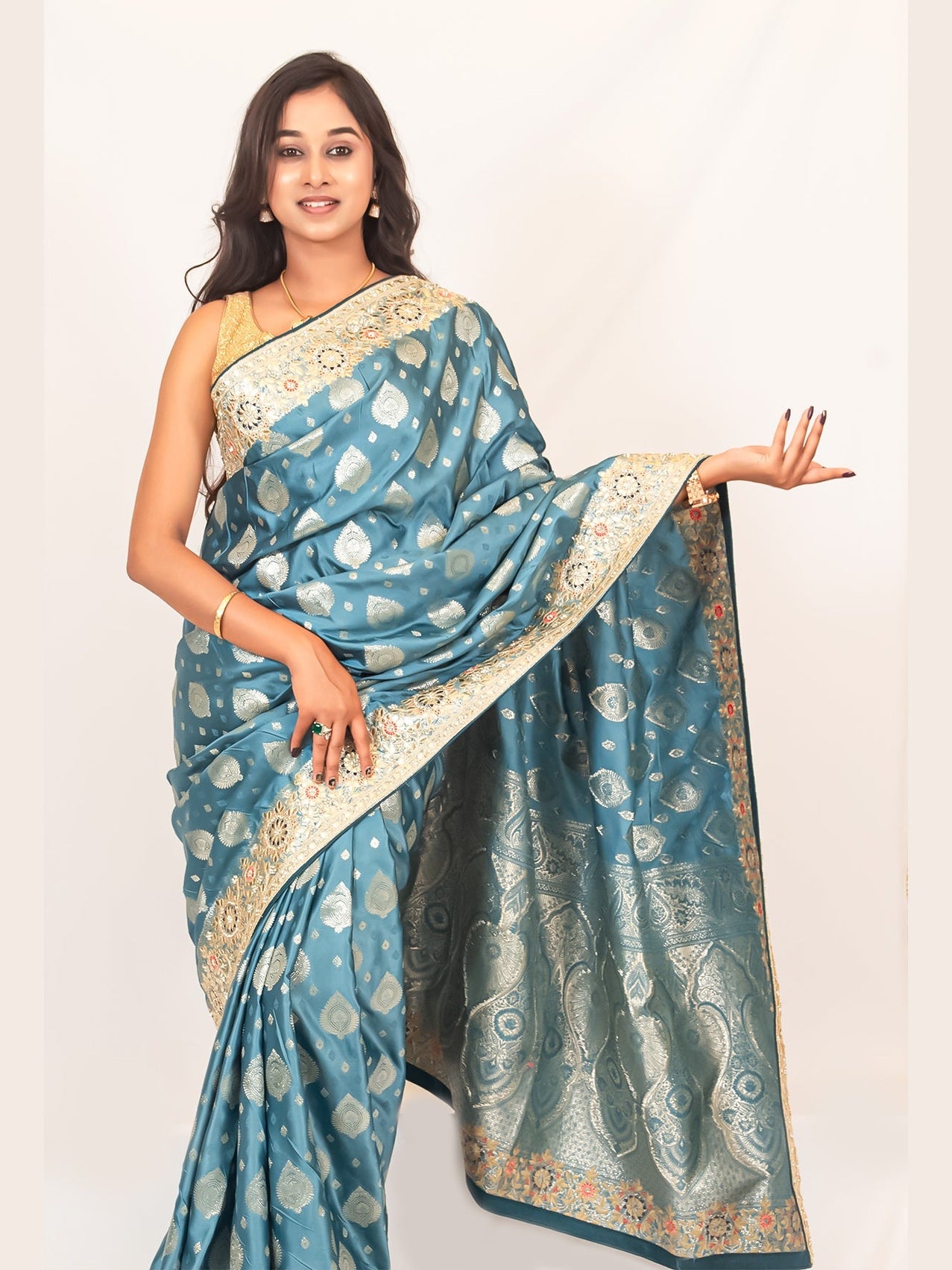 Luxurious Grace Blue Raw Silk Saree with Golden Zari and Stone Detailing