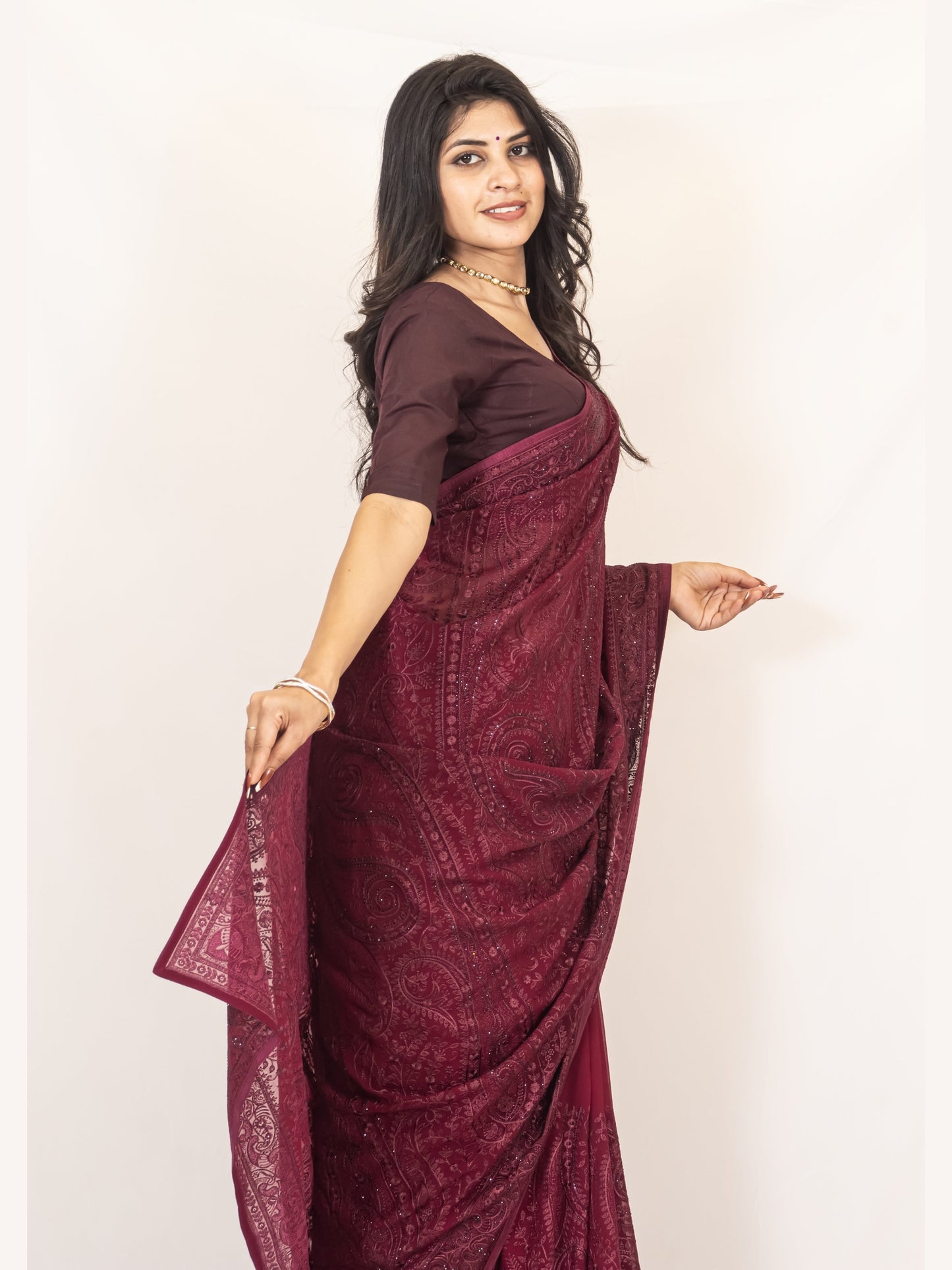 Exquisite Wine Georgette Saree with Resham Work & Swarovski Embellishments