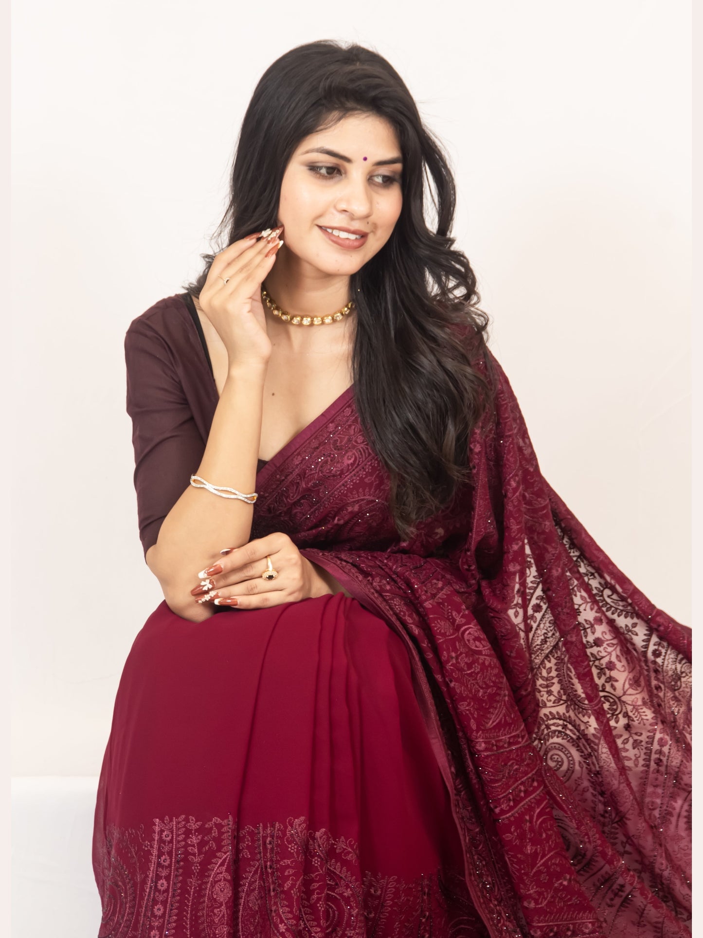 Exquisite Wine Georgette Saree with Resham Work & Swarovski Embellishments