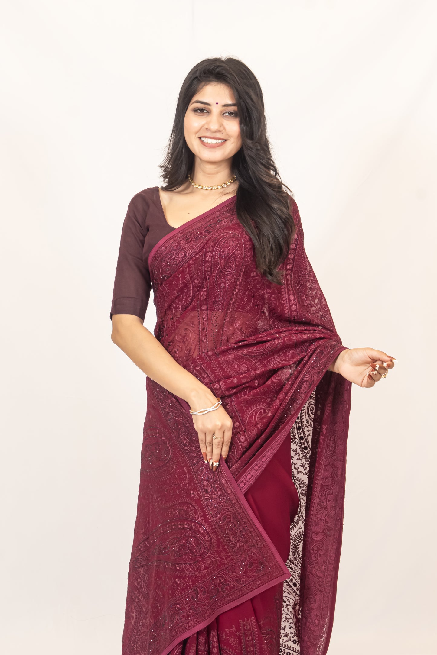 Exquisite Wine Georgette Saree with Resham Work & Swarovski Embellishments