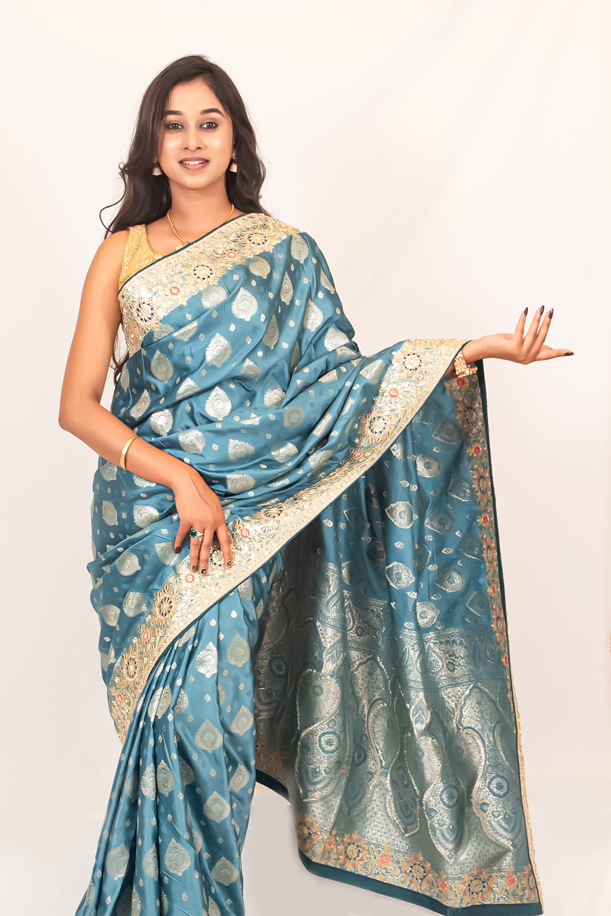 Luxurious Grace Blue Raw Silk Saree with Golden Zari and Stone Detailing