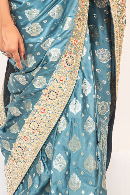 Luxurious Grace Blue Raw Silk Saree with Golden Zari and Stone Detailing